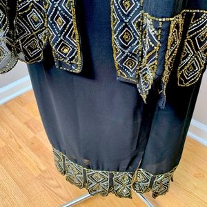 Stunning beaded three piece formal gown